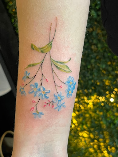 Explore mom of 2 tattoo ideas, creative tattoo ideas in Huxley, available at Lonely Bones Tattoo & Art