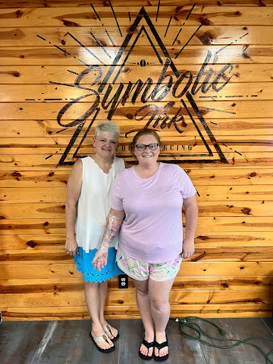 Explore yahweh tattoo ideas, creative tattoo ideas in Foley, available at Symbolic Ink Tattoo Studio