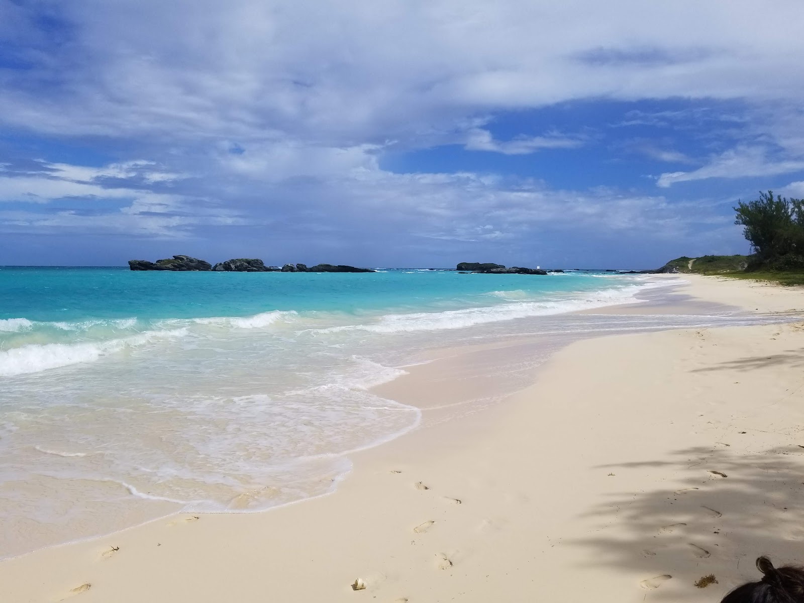 Φωτογραφία του Clearwater Beach με καθαρό νερό επιφάνεια