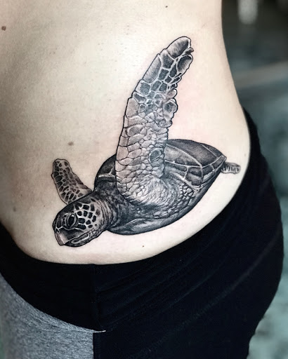 Explore iris flower tattoo ideas, creative tattoo ideas in Charlotte, available at Tattoo Me Charlotte