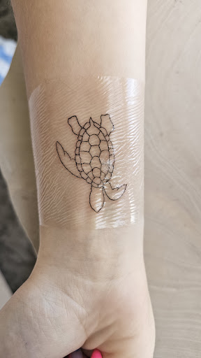 Explore couple finger tattoo ideas, creative tattoo ideas in Honolulu, available at Tattoolicious Tattoo Waikiki