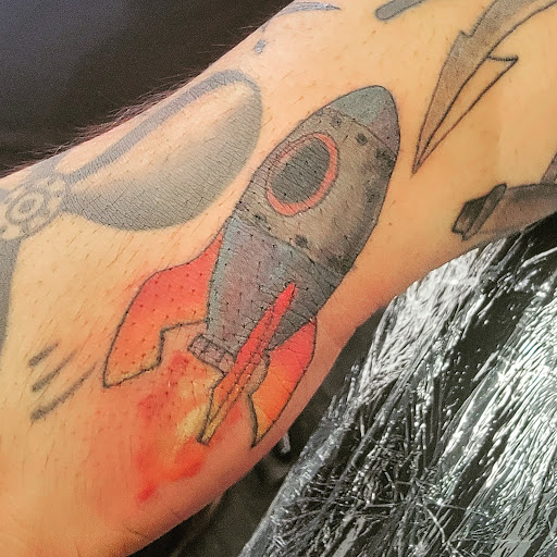 Explore flower back tattoo ideas, creative tattoo ideas in Modesto, available at The Tattoo Shop