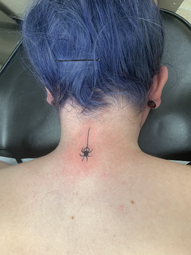 Explore skull and rose tattoo ideas, creative tattoo ideas in Portsmouth, available at GREGS TATTOOS LLC