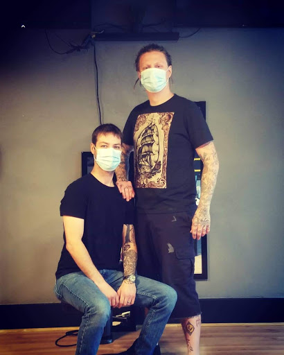 Explore bald head tattoo ideas, creative tattoo ideas in Omaha, available at Collective Hive Tattoo