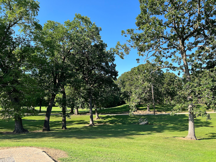 Park near Azure Sky Motel