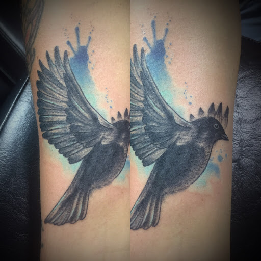 Explore motorbike tattoo ideas, creative tattoo ideas in Portland, available at Art Immortal Tattoo and Piercing