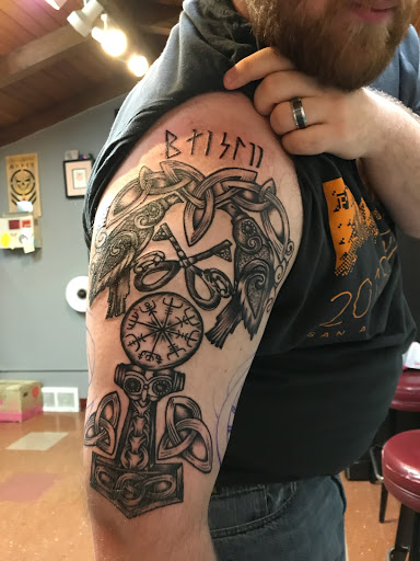 Explore killer whale tattoo ideas, creative tattoo ideas in Omaha, available at Liquid Courage Tattoos