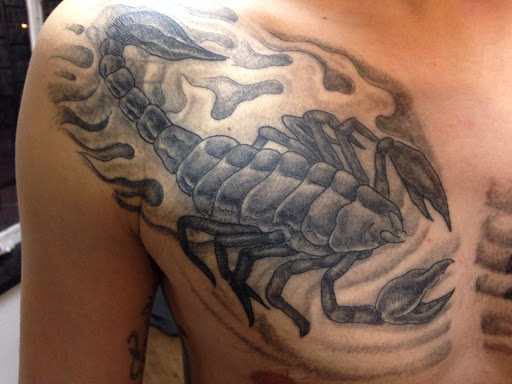 Explore love symbol tattoo ideas, creative tattoo ideas in Edmond, available at The Tattoo Shop Edmond