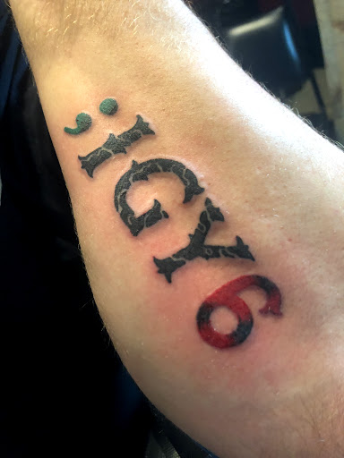 Explore butterfly semicolon tattoo ideas, creative tattoo ideas in Cape Coral, available at UNRIVALED INK