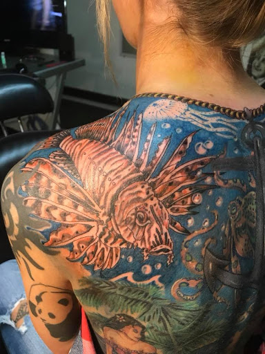 Explore head tattoo ideas for females, creative tattoo ideas in New Port Richey, available at Zodiac Tattooing & Body Piercing