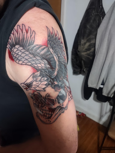 Explore cat outline tattoo ideas, creative tattoo ideas in Omaha, available at Grinn & Barrett Tattoo