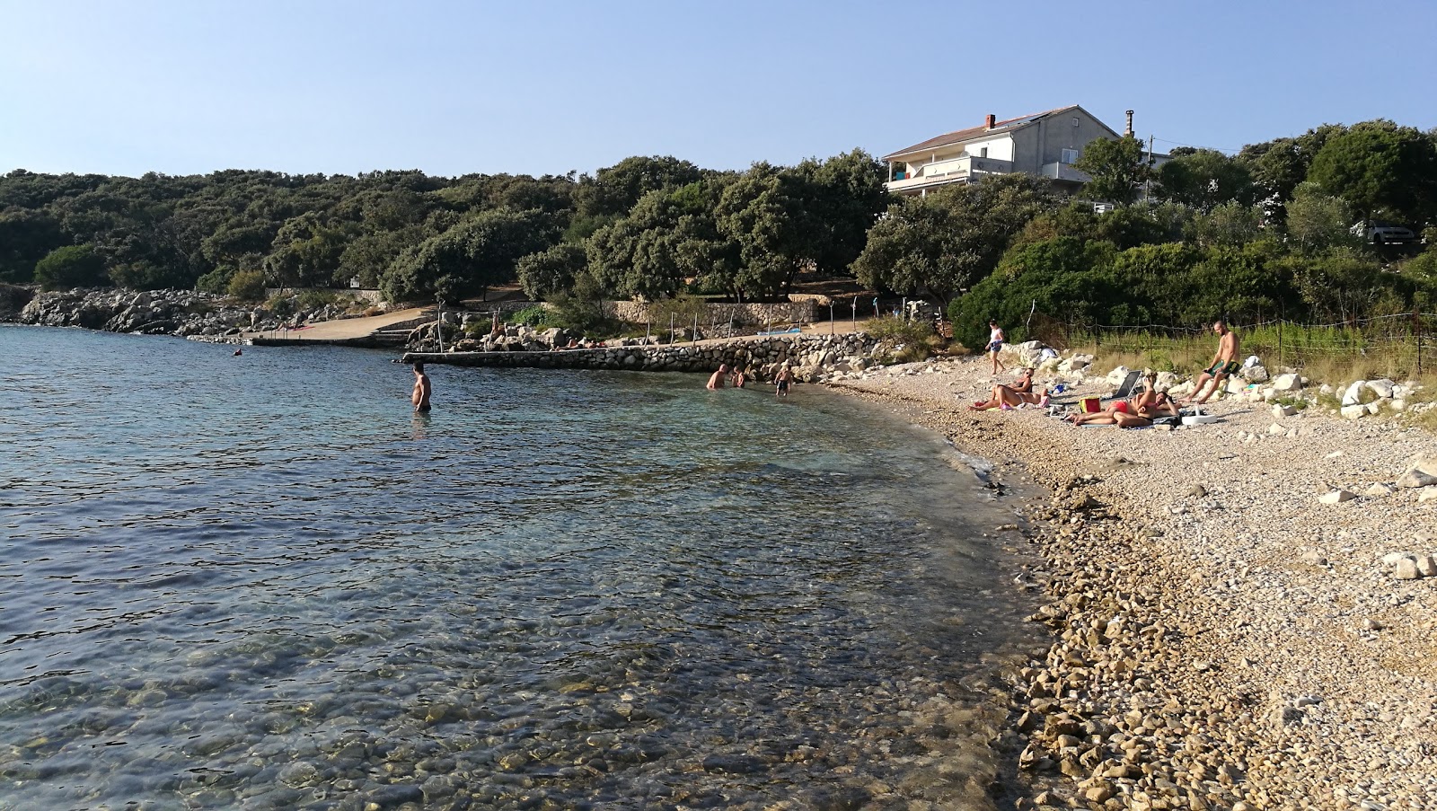 Foto van Tajana beach met lichte kiezelsteen oppervlakte