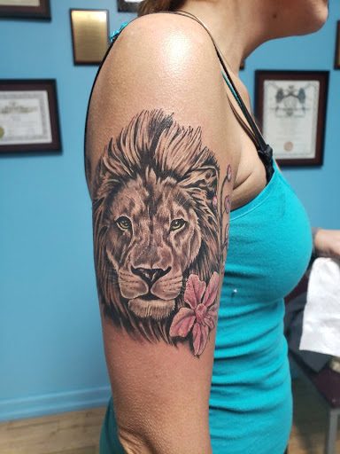 Explore arm sleeve tattoo ideas for men, creative tattoo ideas in Houghton, available at Edge Tattoo Inc