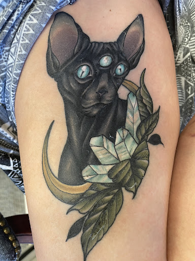 Explore red hand tattoo ideas, creative tattoo ideas in Naugatuck, available at Tooth And Nail Tattoo