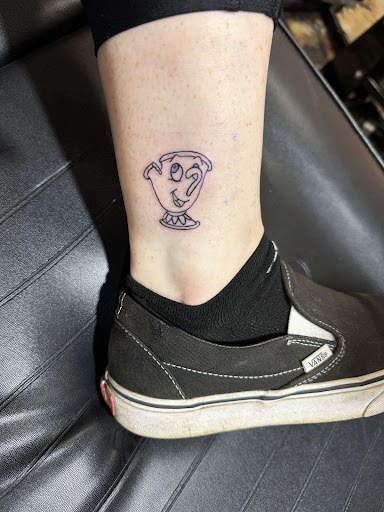 Explore cool face tattoo ideas, creative tattoo ideas in Pineville, available at Epic Ink Studio