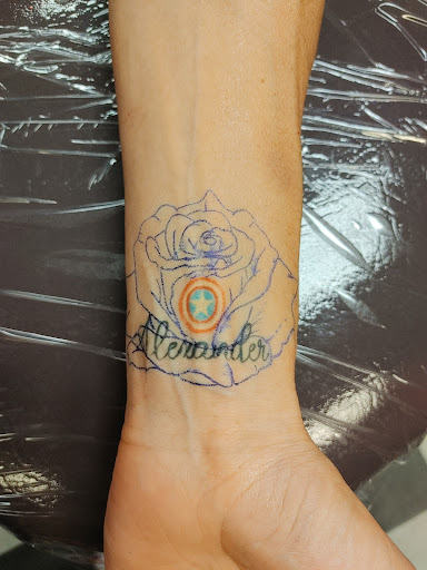 Explore back arm tattoo ideas, creative tattoo ideas in Newport, available at T N T Explosive Tattoo