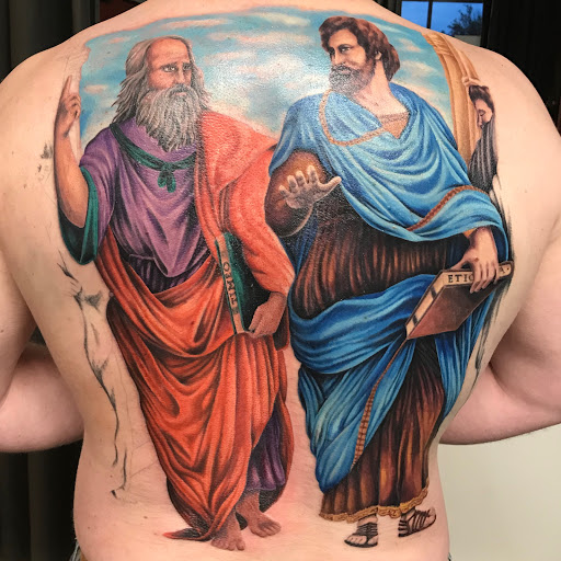 Explore womb tattoo ideas, creative tattoo ideas in Atlanta, available at Empyrean Tattoo Studio