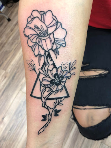 Explore thigh tattoos ideas for guys, creative tattoo ideas in Mchenry, available at Lunchbox Tattoo and Body Piercing