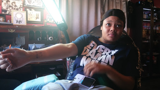 Explore name tattoo ideas on chest, creative tattoo ideas in Dallas, available at Lamar Street Tattoo Club