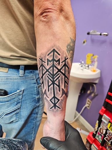 Explore cycling tattoo ideas, creative tattoo ideas in Cambridge, available at Kappa Tattoo