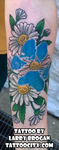 Explore microphone tattoo ideas, creative tattoo ideas in Lockport, available at Tattoo City by Larry Brogan