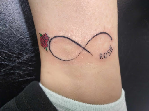 Explore handcuff tattoo ideas, creative tattoo ideas in Salem, available at Outwest Tattoo and body piercing ,30 years of tattooing,only life time guarantee