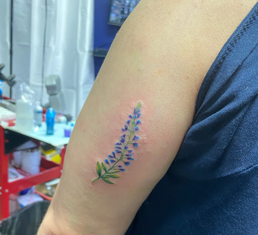 Explore cover up tattoo ideas on chest, creative tattoo ideas in Bronx, available at Brass Knuckles Ink Tattoo Studio