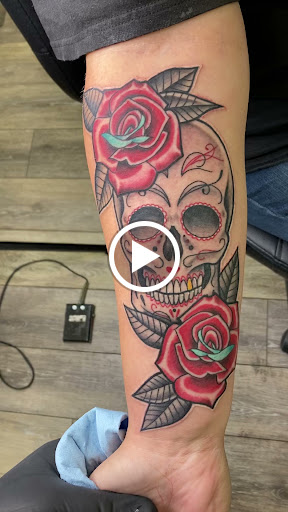 Explore dragonfly flower tattoo ideas, creative tattoo ideas in Bullhead City, available at Smoke and Dagger Tattoo