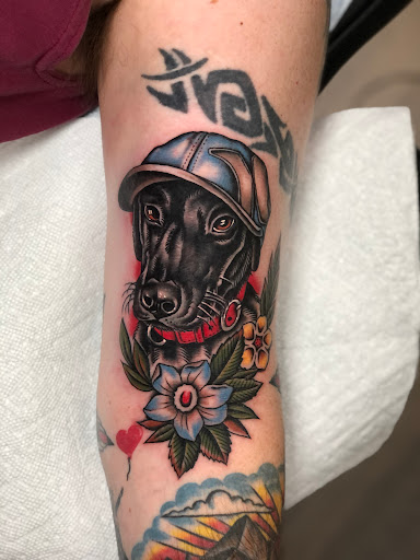 Explore memorial cross tattoo ideas, creative tattoo ideas in Oakwood, available at Victory Tattoo Co