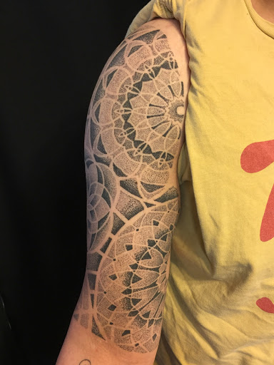 Explore great tattoo cover up ideas, creative tattoo ideas in Laramie, available at Vintage Electric Tattoo