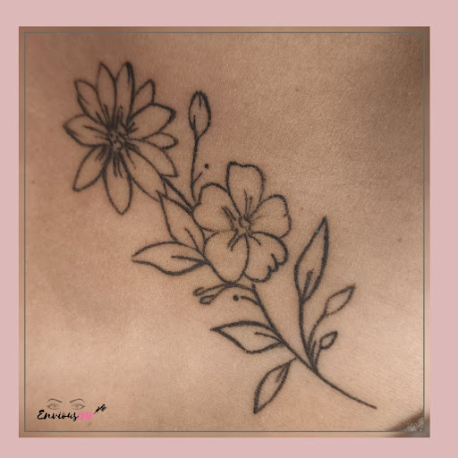 Explore knee scar tattoo ideas, creative tattoo ideas in Madisonville, available at Envious INK