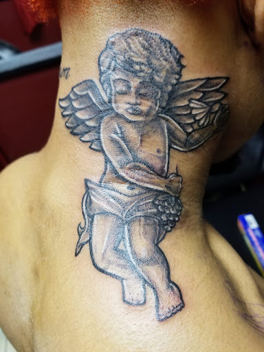 Tattoo Shop «Romantic Torture Tattoo», reviews and photos, 3501 Capital Blvd, Raleigh, NC 27604, USA