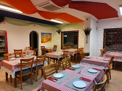 OM Restaurante Indian Pollença Food & Drinks - Carrer del Jonquet, 59, 07460 Pollença, Illes Balears, Spain