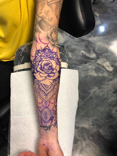 Explore black cover up tattoo ideas, creative tattoo ideas in Edgewood, available at Evolved Body Arts