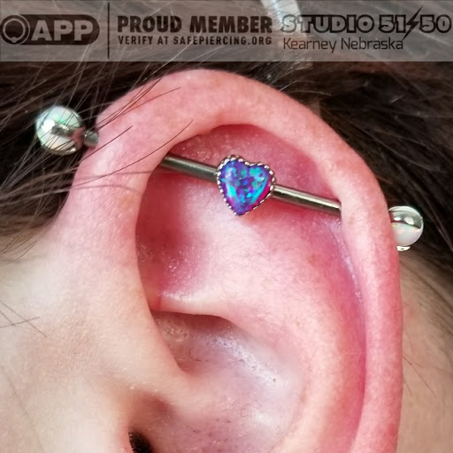 Explore tattoo ideas for men upper arm, creative tattoo ideas in Kearney, available at Studio 5150 Piercing & Fine Jewelry