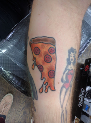 Explore elegant spine tattoo ideas, creative tattoo ideas in Amityville, available at South Shore Tattoo