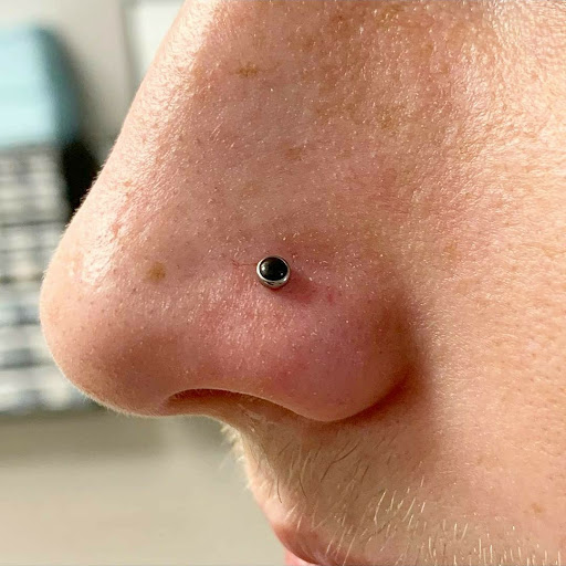 Explore coco tattoo ideas, creative tattoo ideas in North Charleston, available at Exotic Impressions Body Piercing