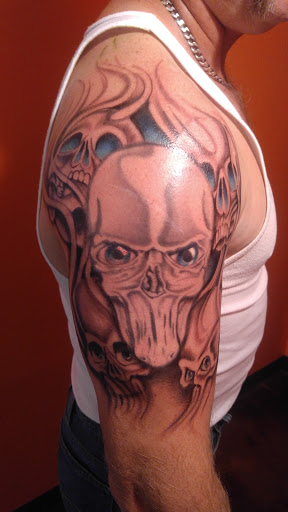 Explore tattoo ideas on ribs, creative tattoo ideas in San Angelo, available at Inkland Tattoo Studio