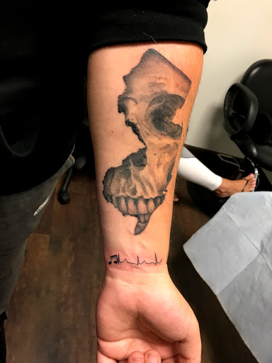 Explore mama bear tattoo ideas, creative tattoo ideas in Raleigh, available at Tattoos by Anton