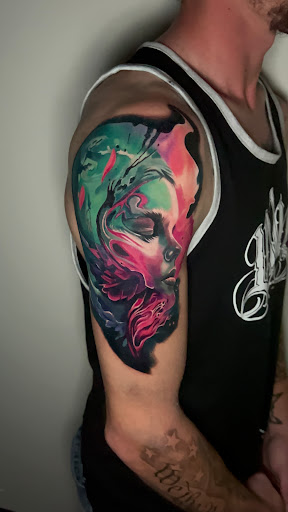 Explore pitbull dog tattoo ideas, creative tattoo ideas in Lakeville, available at SharkTooth Tattoo & Gallery