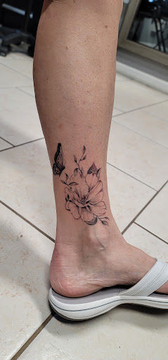 Explore dad son tattoo ideas, creative tattoo ideas in Ocoee, available at Slaughterized Ink Tattoo and Piercing Studio