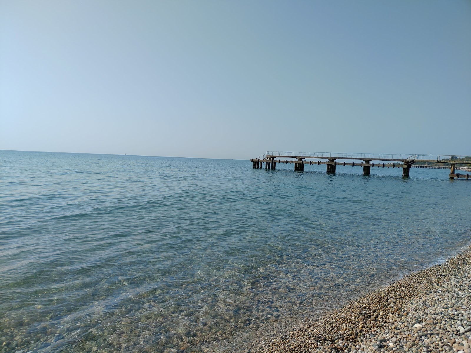 Novyy Afon beach'in fotoğrafı uçurumlarla desteklenmiş