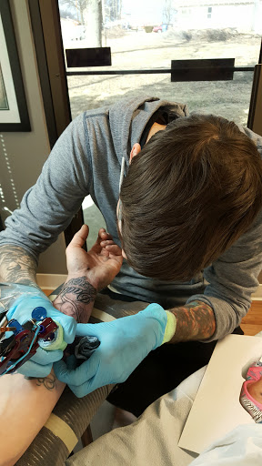 Explore grandchildren tattoo ideas for men, creative tattoo ideas in Des Moines, available at Arcadian Tattoo