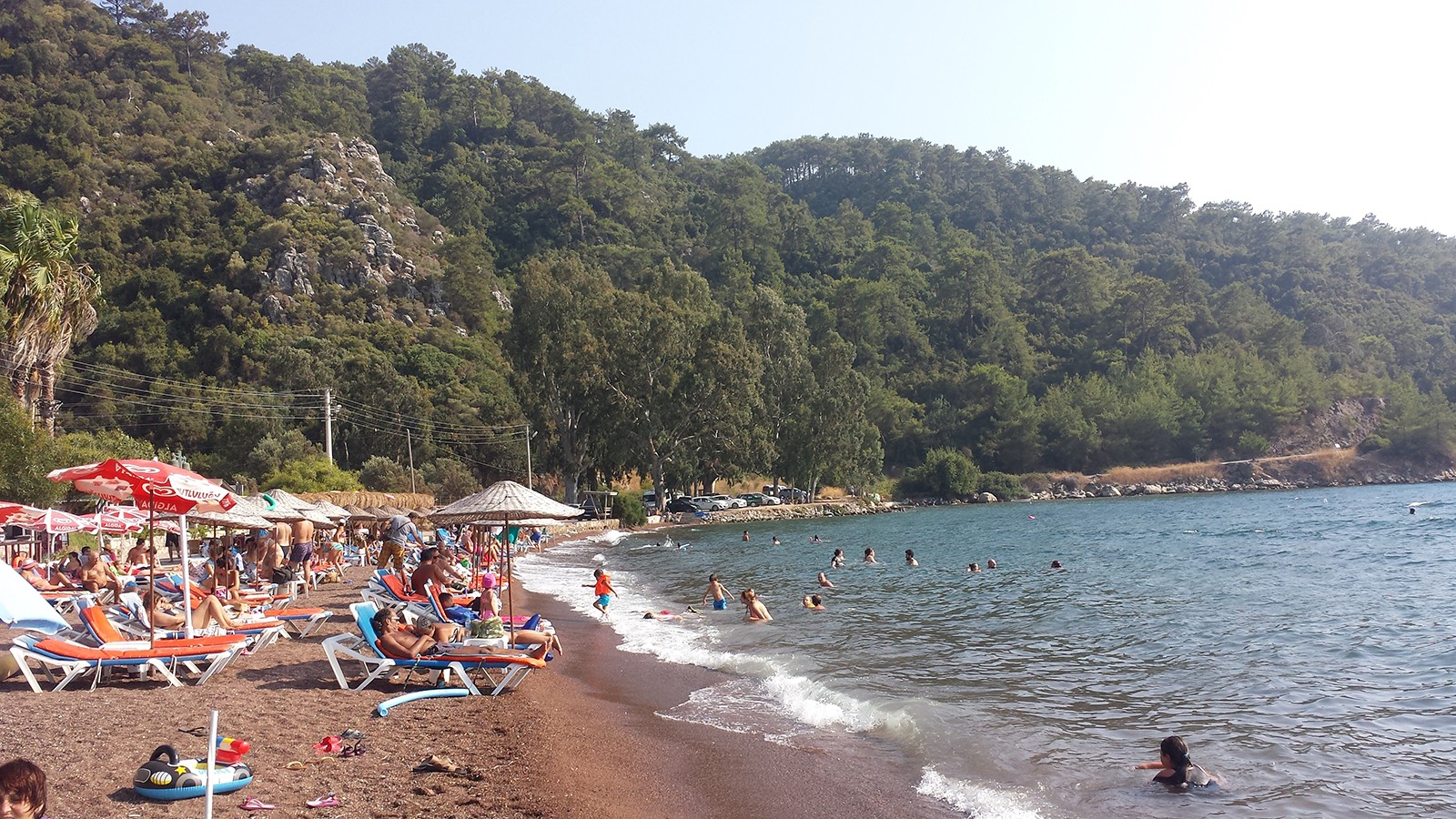 Foto von Hisaronu Koyu beach und die siedlung
