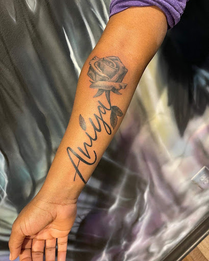 Explore tattoo ideas behind the ear, creative tattoo ideas in Clarksville, available at Dark Raine Tattoo