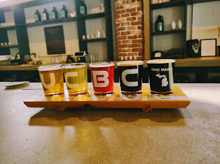 Friends sharing beers at a table