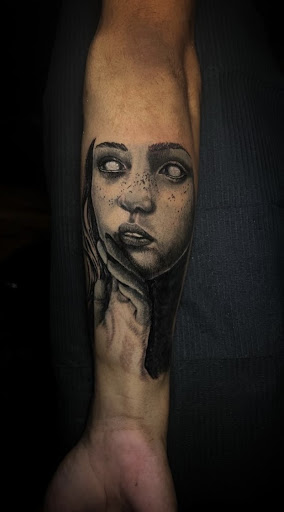 Explore mens tattoos on wrist ideas, creative tattoo ideas in Kissimmee, available at Ol Skool Tattoos Studio