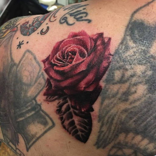 Explore women's quarter sleeve tattoo ideas, creative tattoo ideas in Chapel Hill, available at Golden Falcon Tattoo and Piercing