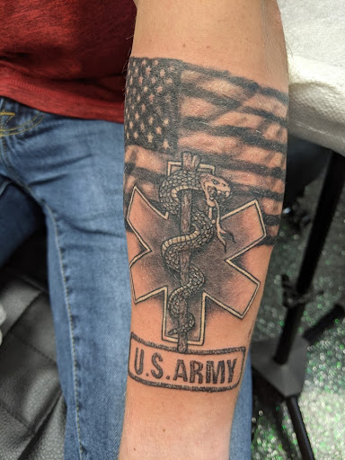 Find chakra tattoo ideas for your next unique tattoo in Slippery Rock at Dinky Dachshund Tattoo Parlor