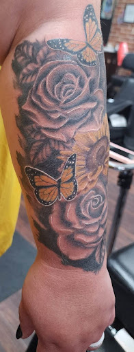 Explore white tattoo ideas, creative tattoo ideas in Dubuque, available at The Crows Nest
